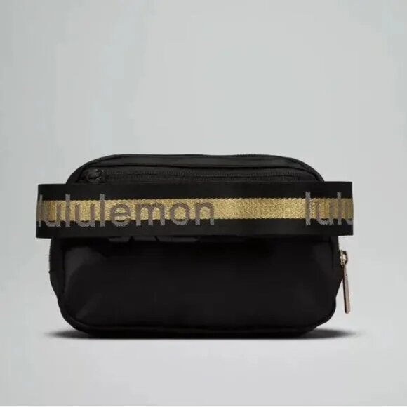 Lululemon Everywhere Crossbody Belt Bag Wordmark Black and Gold Logo - Picture 3 of 4